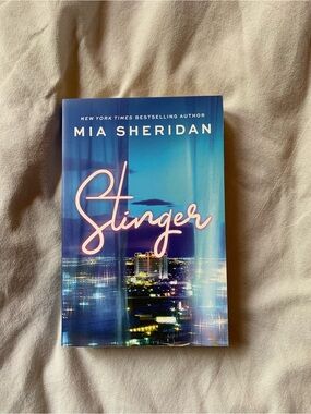 Stinger by Mia Sheridan in paperback